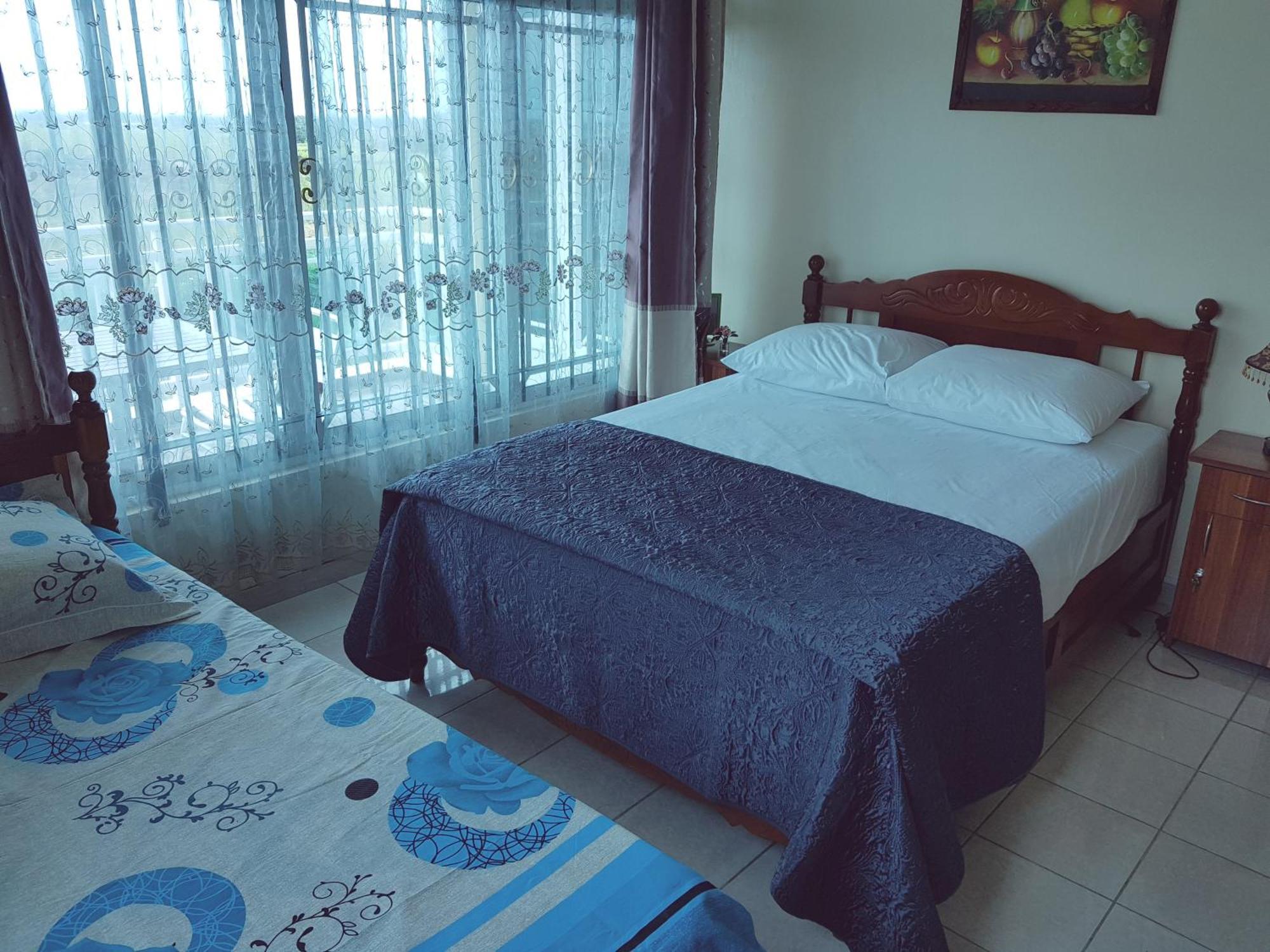 Luxor Residence Guesthouse Belle Mare Ruang foto